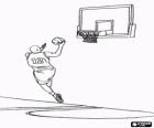 Μπάσκετ παίκτης πηγαίνει για το καλάθι